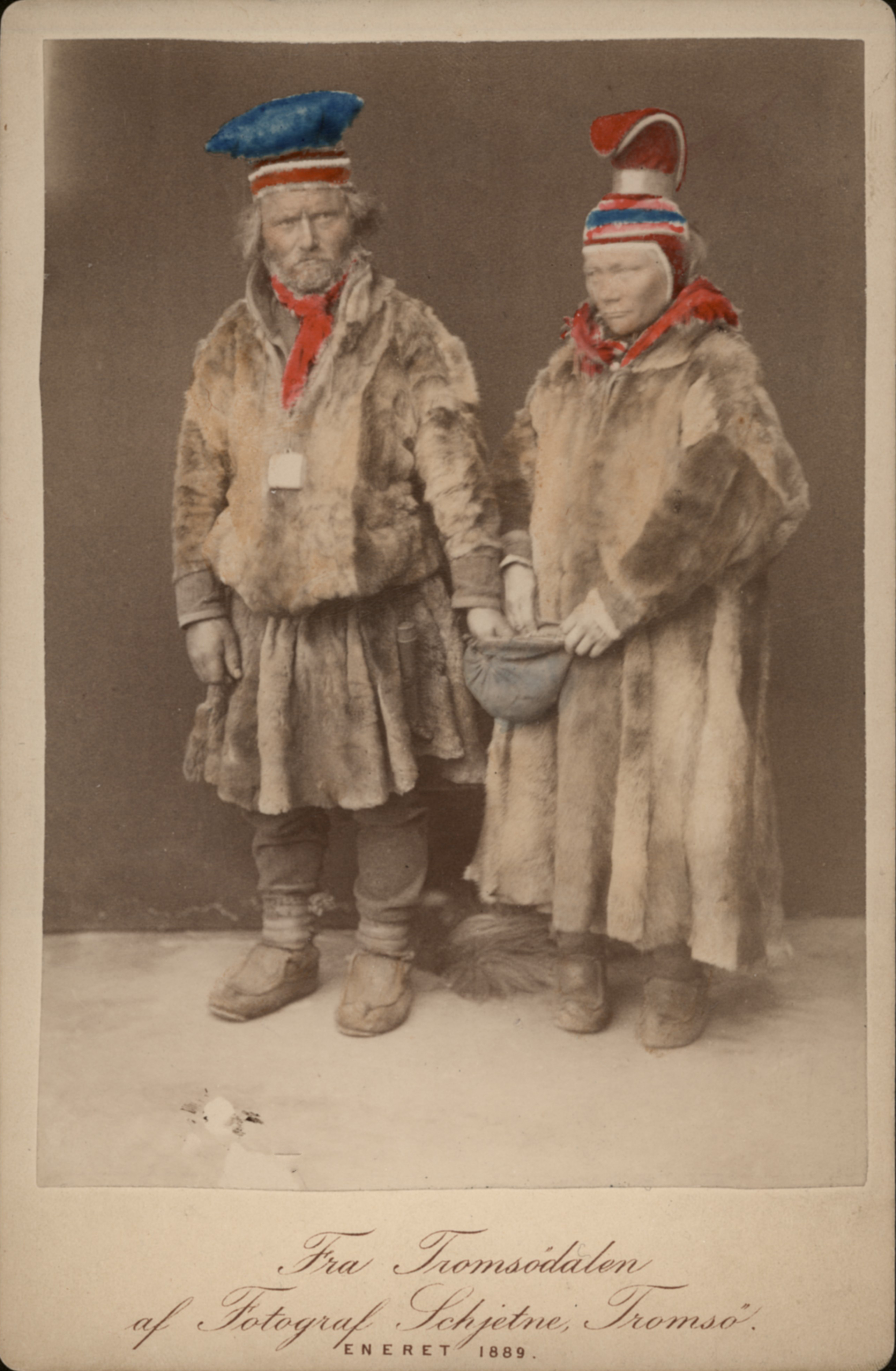 "Two People Dressed in Fur"